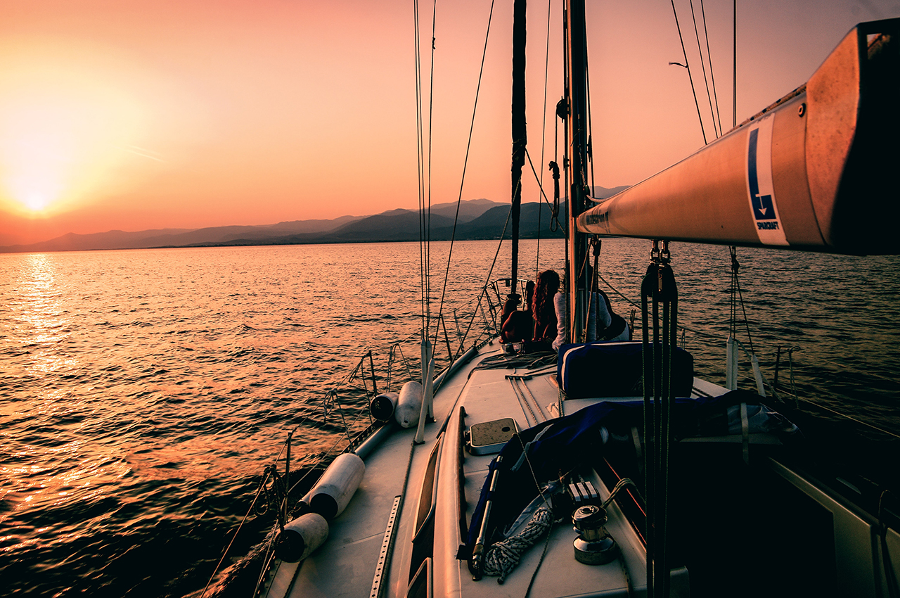 Sunset sail with glass of Champagne